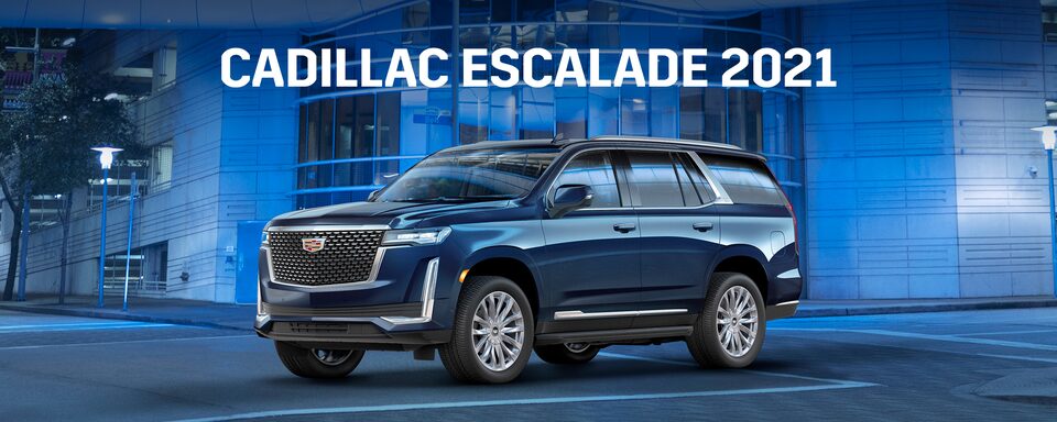 Cadillac Escalade 2021 SUV en color Darkmoon blue metallic con acentos en galvano en parrilla, fascia delantera y más