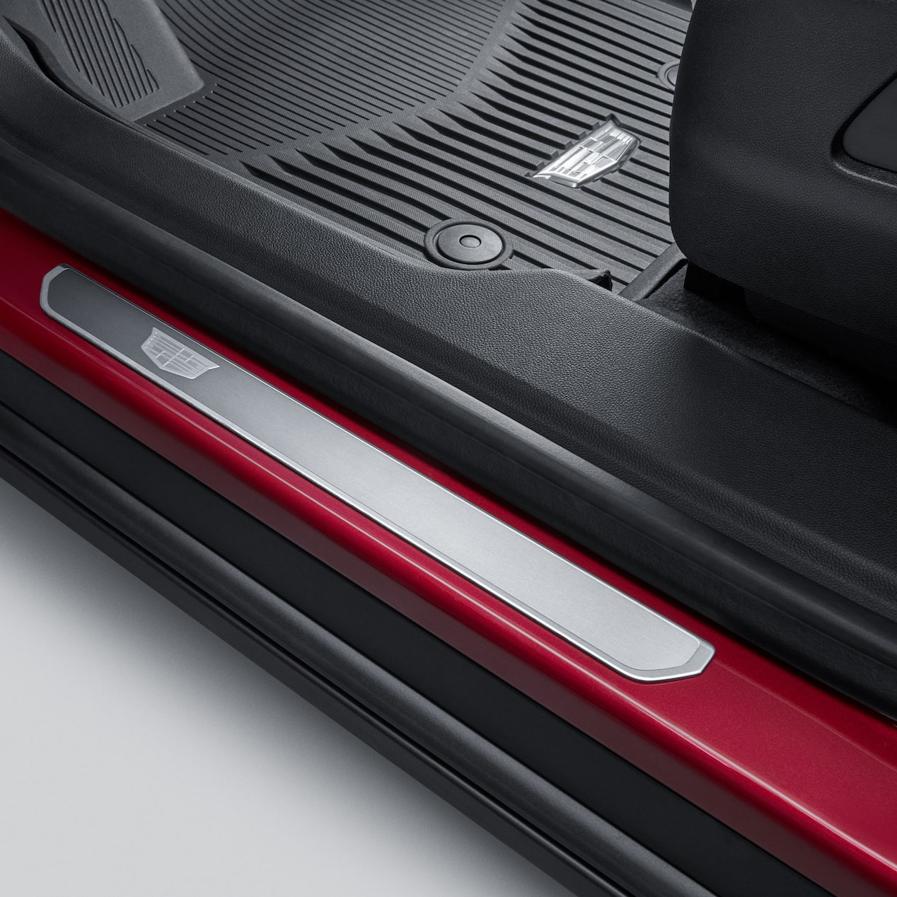 Tapete de vinil rígido de segunda fila con logo en negro para tu Cadillac XT4 2025