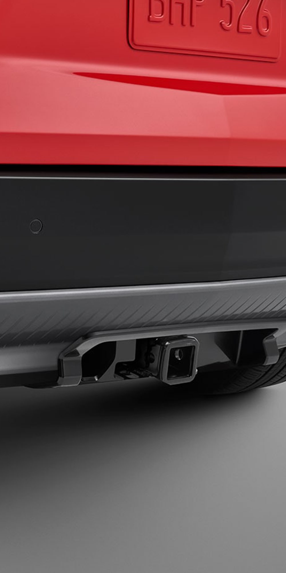 Cadillac OPTIQ 2026, cubierta embellecedora para enganche de remolque